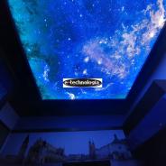 Oświetlenie w sypialni - sufit napinany galaktyka